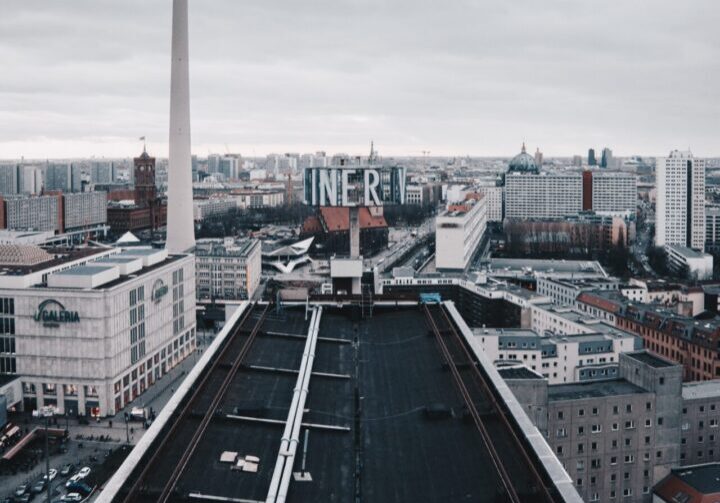 Long flat rooftop leading to city skyline